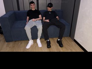 Two friends are watching TV